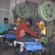 A small press in an auto parts factory in Gurgaon.